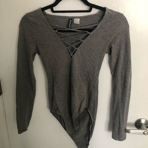 Gray front laced body suit